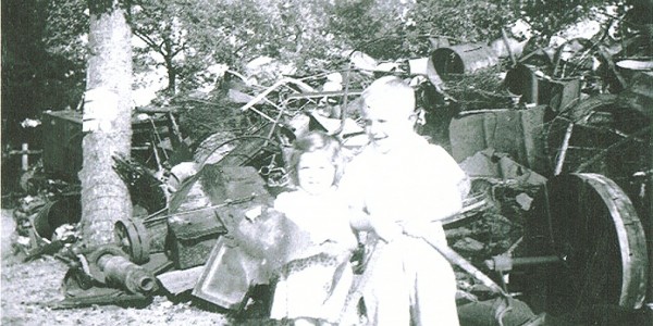Blake And Sue Sims By A Scrap Iron Pile In The 1940s
